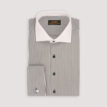 A black and white striped dress shirt with square buttons and French cuffs