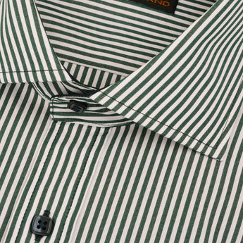 Close up of green striped shirt with square buttons